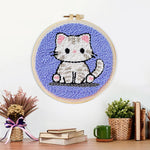 Finished innocent little kitten artwork displayed on a wall