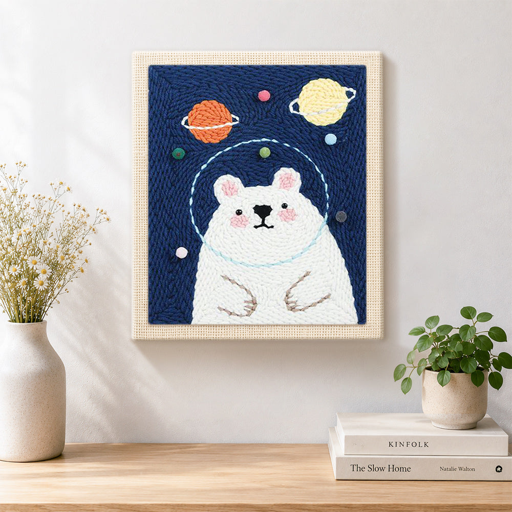 Finished kawaii astronaut bear artwork displayed on a wall
