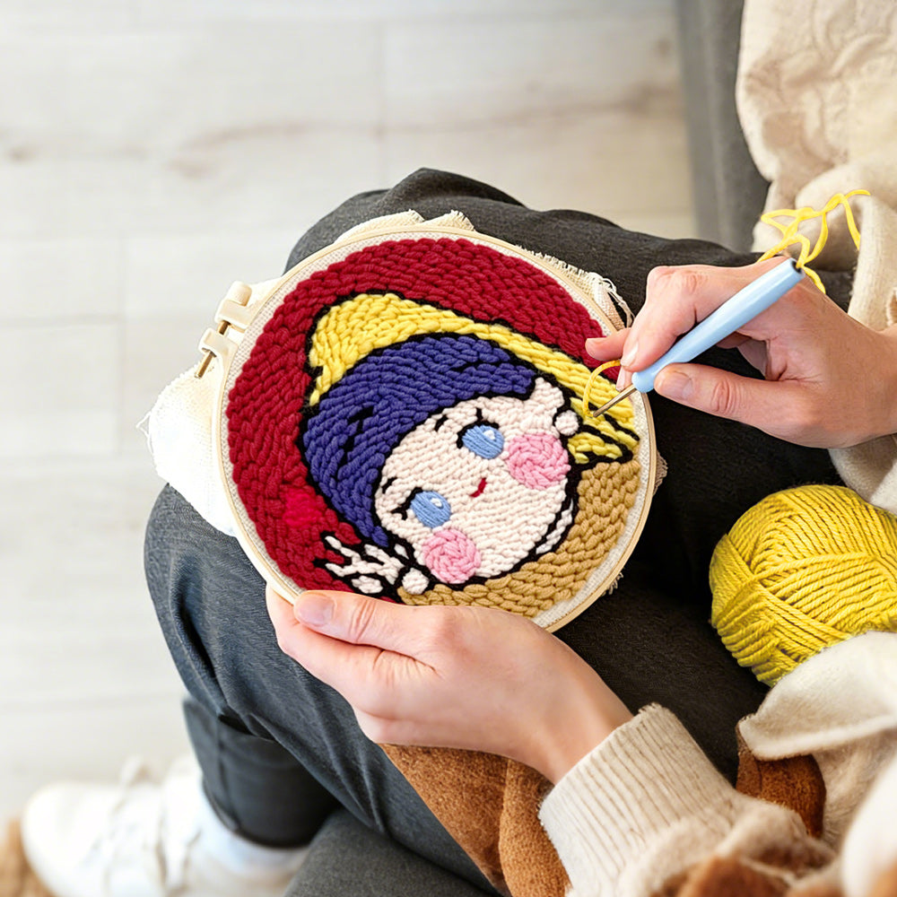 Creating handmade kawaii "girl with a pearl earring" parody punch needle artwork