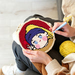 Creating handmade kawaii "girl with a pearl earring" parody punch needle artwork