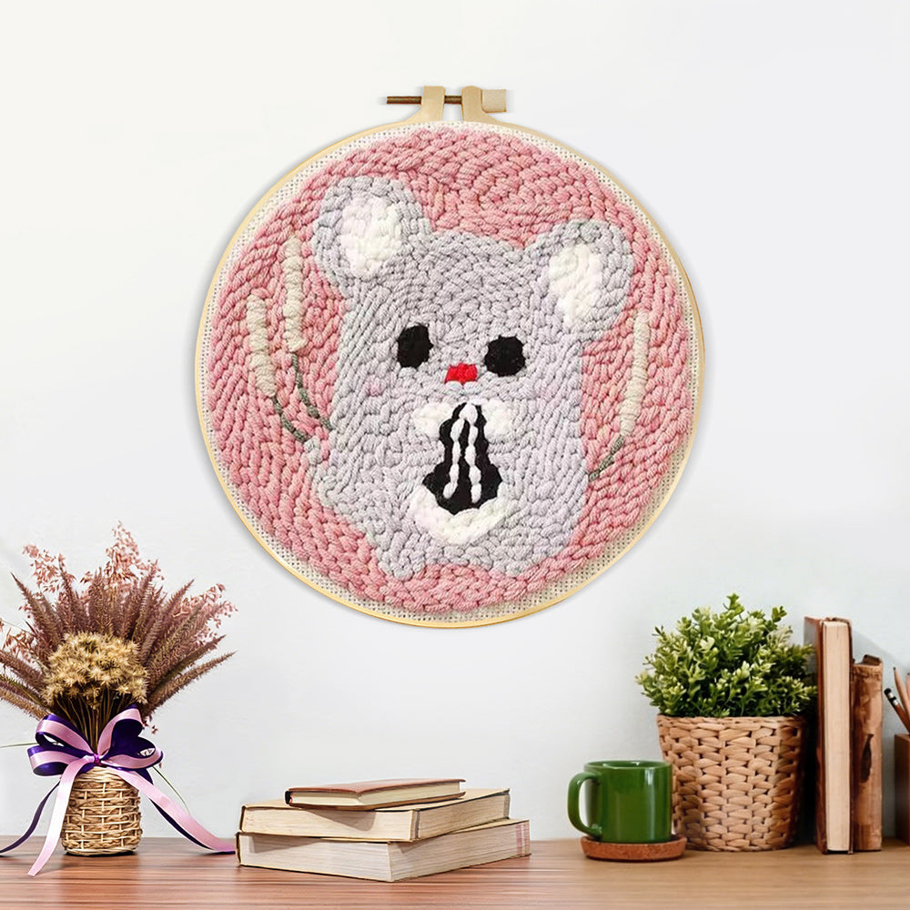 Finished kawaii mouse artwork displayed on a wall