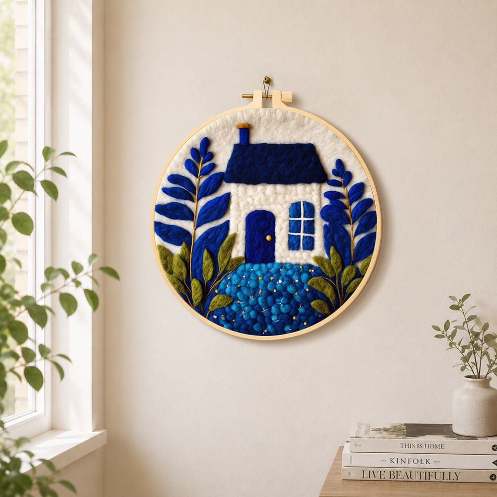 Klein blue and white cottage needle felt wall art displayed in a bright home interior