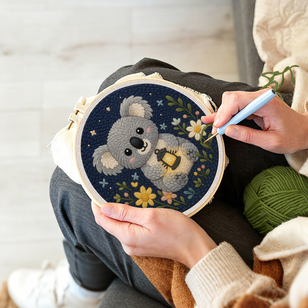 Creating handmade koala and wildflowers punch needle artwork