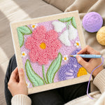 Creating handmade large pink and purple flowers punch needle artwork