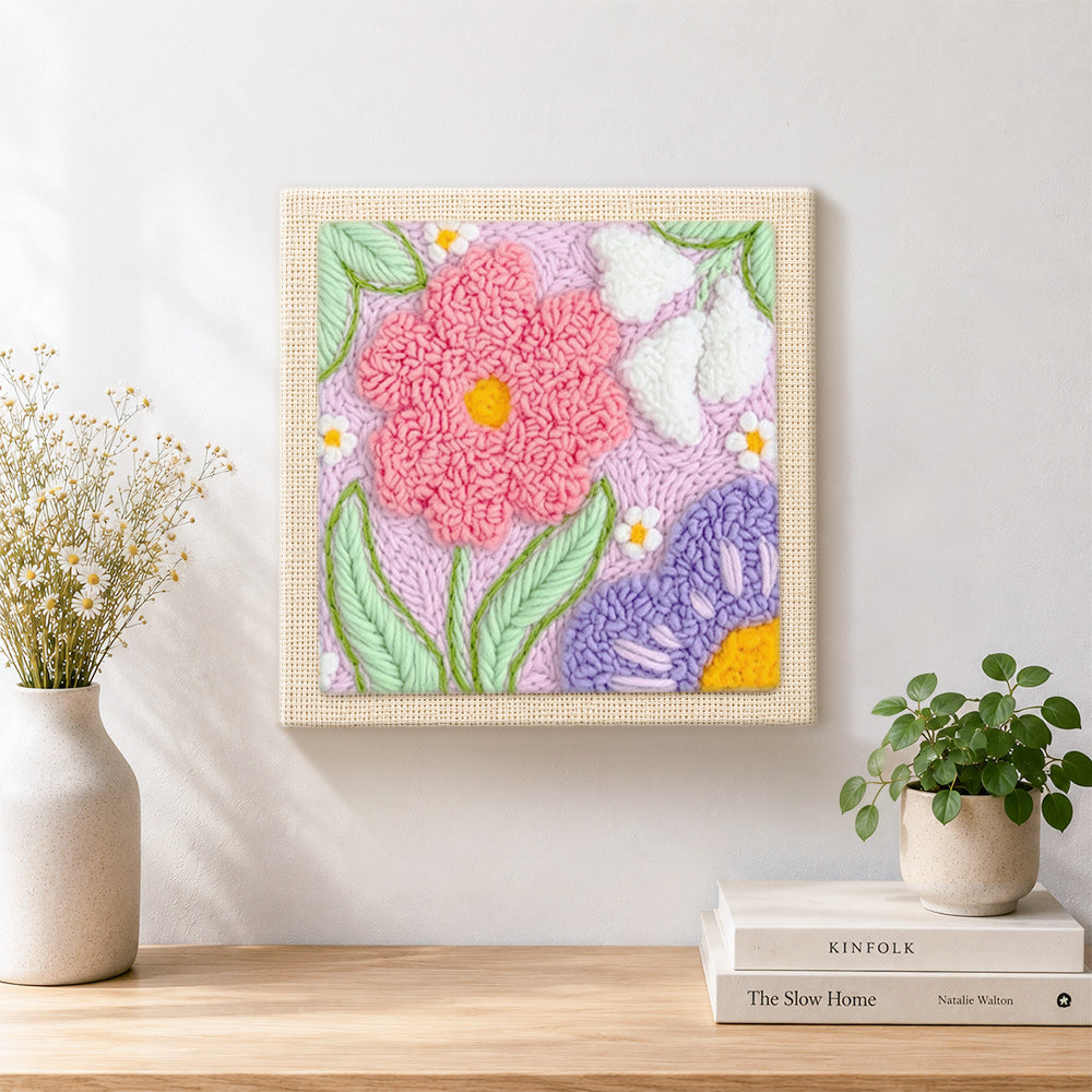 Finished large pink and purple flowers artwork displayed on a wall
