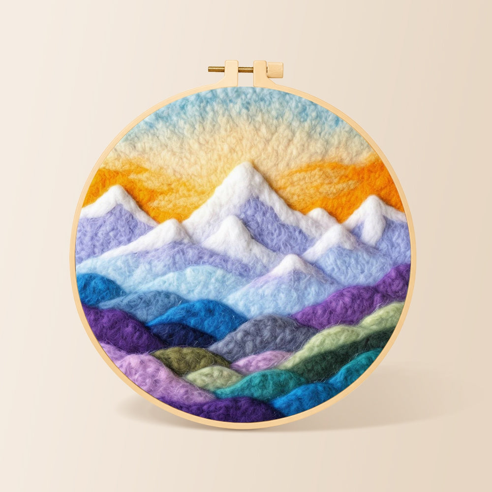 Layered colourful mountain peaks at sunrise needle felting kit for beginners with a round wooden frame