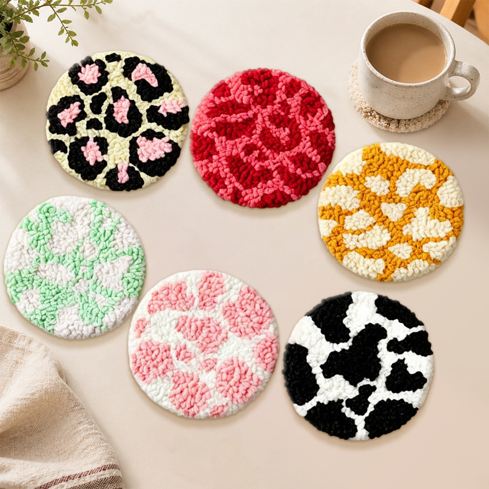Leopard print and cow print punch needle coasters used for home decoration