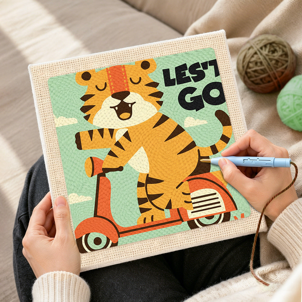 Creating handmade "LET'S GO" tiger on scooter punch needle artwork