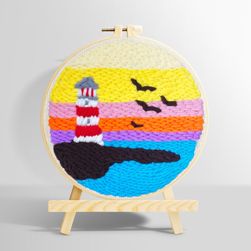 Lighthouse at sunset over ocean punch needle kit for beginners