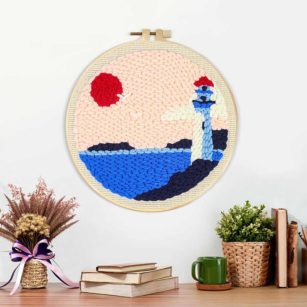 Finished lighthouse by the sea artwork displayed on a wall