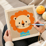 Creating handmade lion in blue shirt punch needle artwork