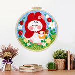 Finished little red riding hood bunny artwork displayed on a wall