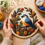 Creating the lovely bird in autumn foliage wool painting by hand with a felting needle