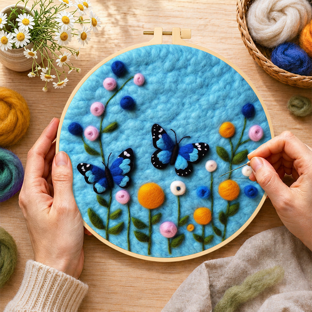 Creating the lovely blue butterflies and flowers wool painting by hand with a felting needle