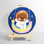 Lovely space bear on a moon swing punch needle kit for beginners