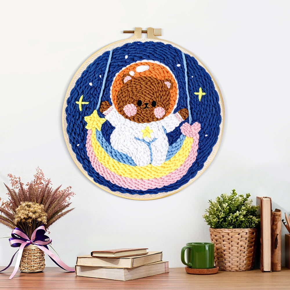 Finished lovely space bear on a moon swing artwork displayed on a wall