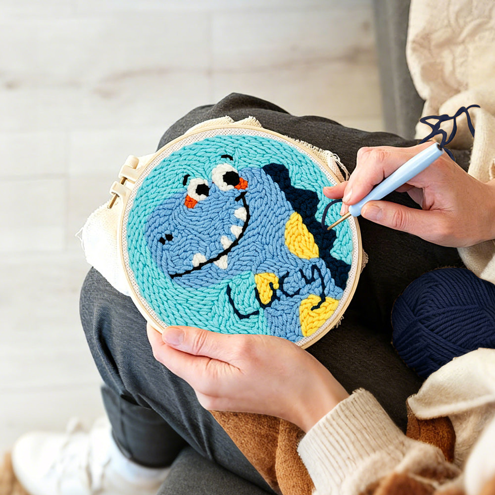 Creating handmade lucky blue dinosaur punch needle artwork
