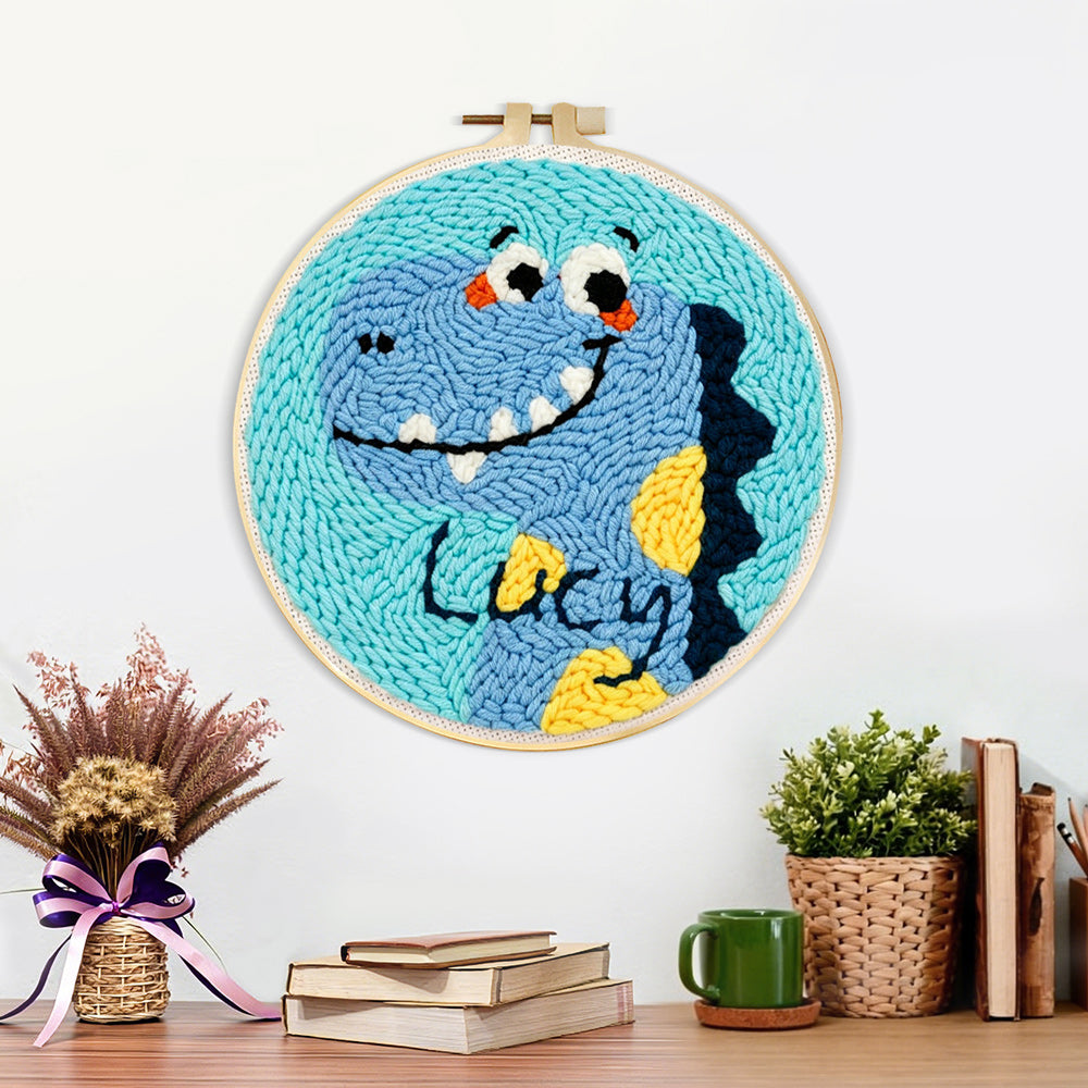 Finished lucky blue dinosaur artwork displayed on a wall