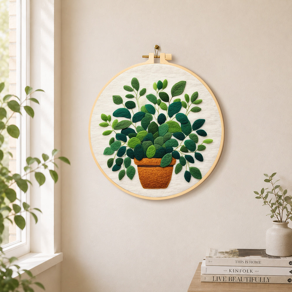 Lush green potted plant needle felt wall art displayed in a bright home interior