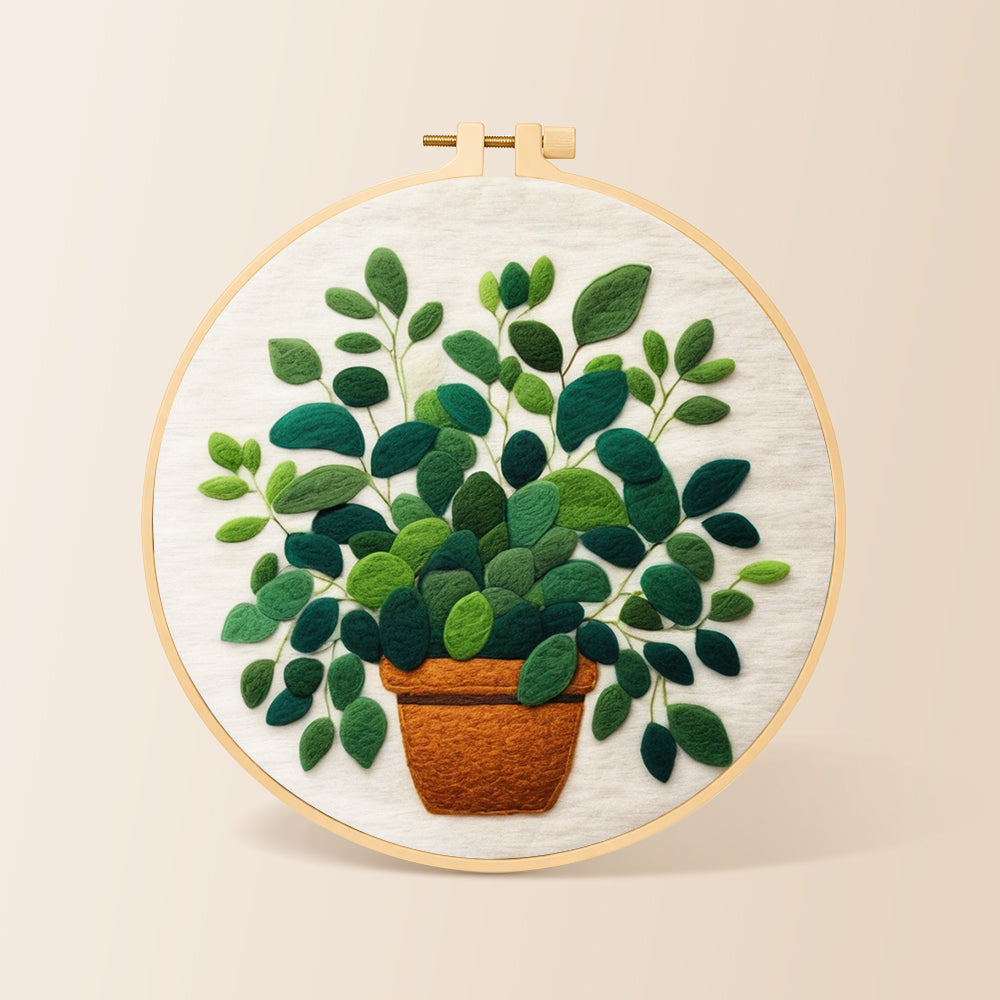 Lush green potted plant needle felting kit for beginners with a round wooden frame