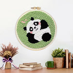 Finished lying panda artwork displayed on a wall