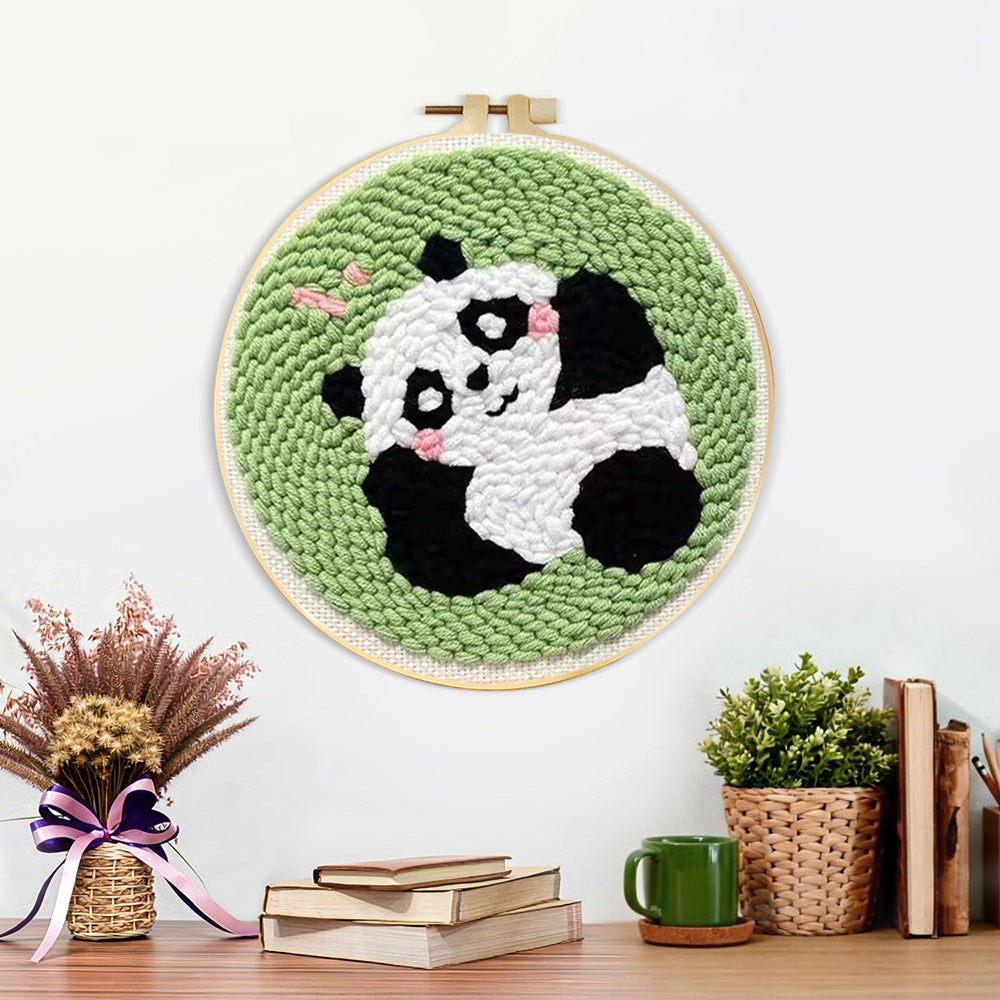 Finished lying panda artwork displayed on a wall