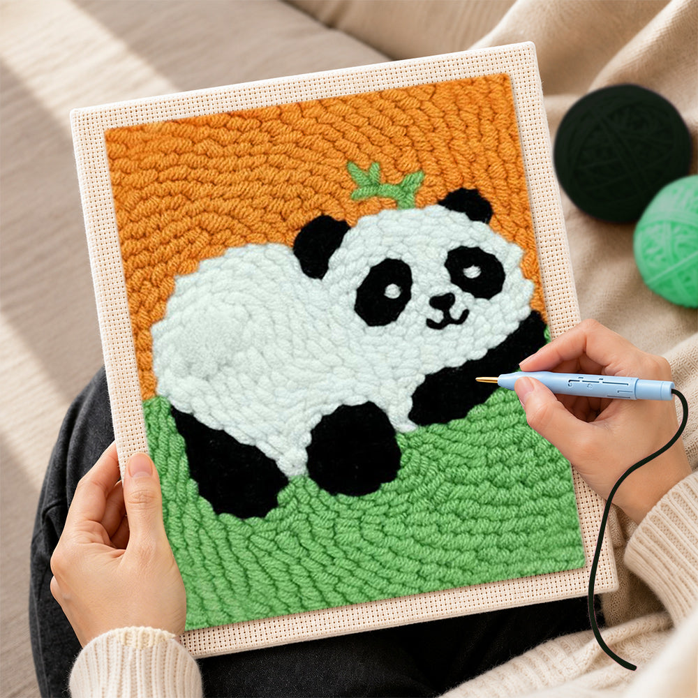 Creating handmade lying panda with bamboo punch needle artwork