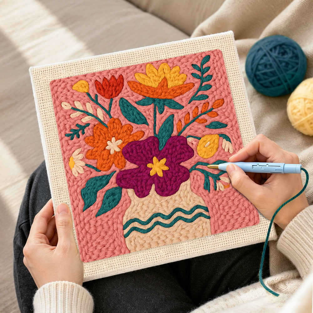 Creating handmade magenta and orange bouquet punch needle artwork