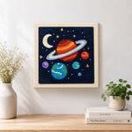 Finished magical and colourful solar system artwork displayed on a wall