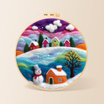 Magical rainbow snowy village at christmas needle felting kit for beginners with a round wooden frame