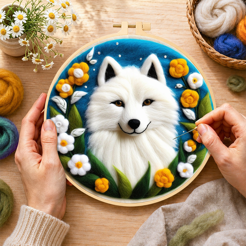 Creating the magical white arctic fox and flowers wool painting by hand with a felting needle
