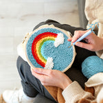 Creating handmade magnificent rainbow in the blue sky punch needle artwork