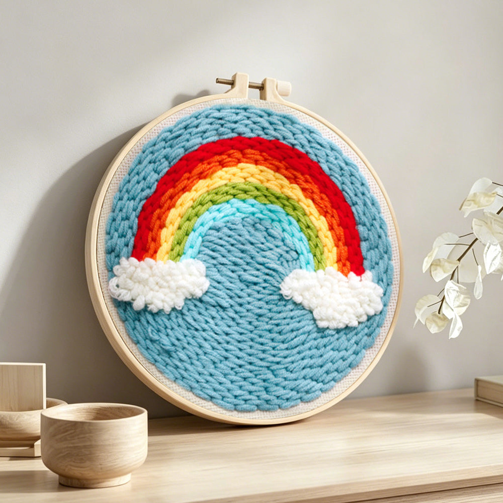 Magnificent rainbow in the blue sky punch needle artwork displayed on a table