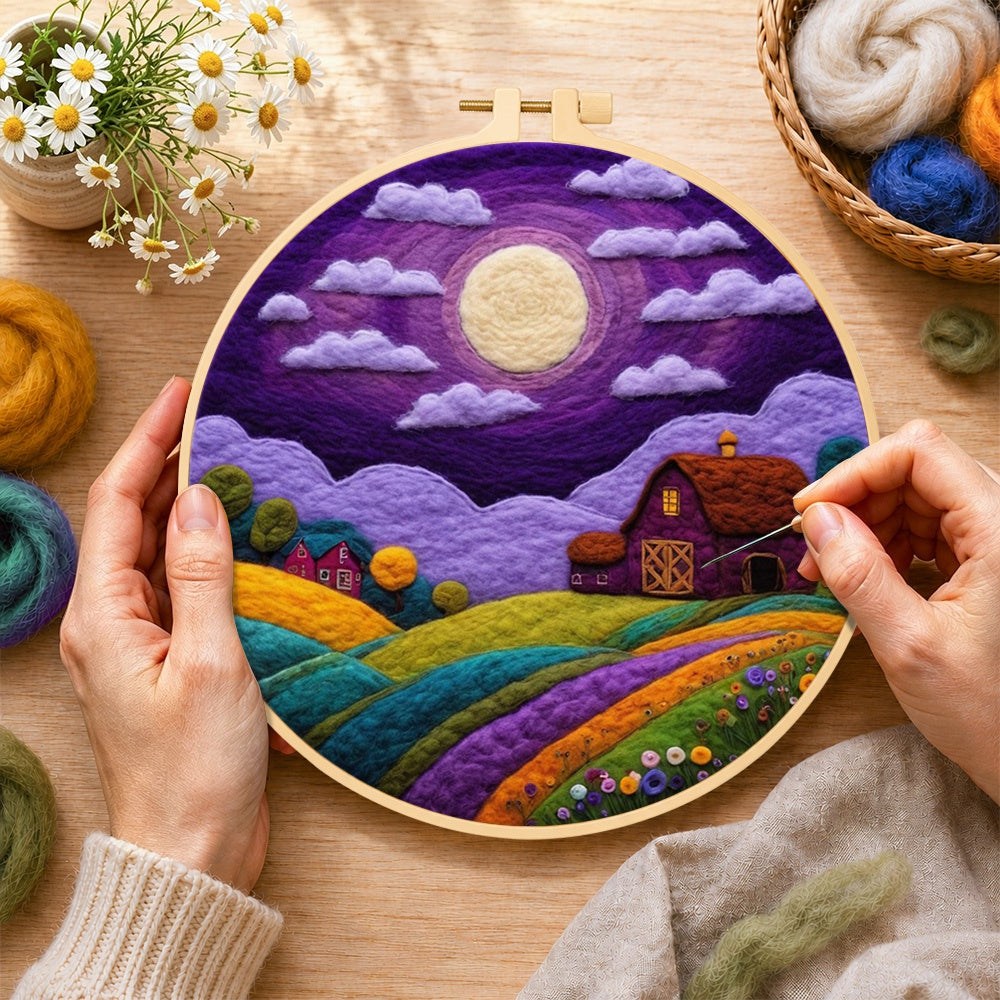 Creating the majestic full moon and purple barn wool painting by hand with a felting needle