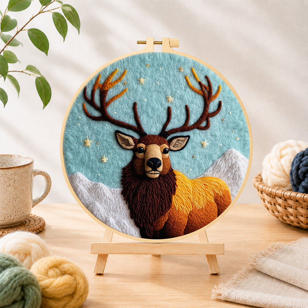 Finished majestic highland stag needle felting displayed on a wooden easel