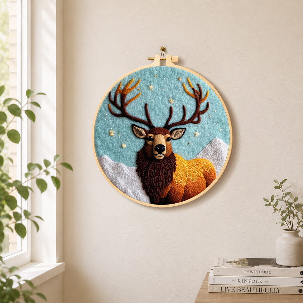 Majestic highland stag needle felt wall art displayed in a bright home interior