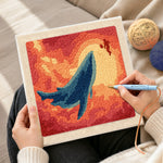Creating handmade majestic whale sunset punch needle artwork