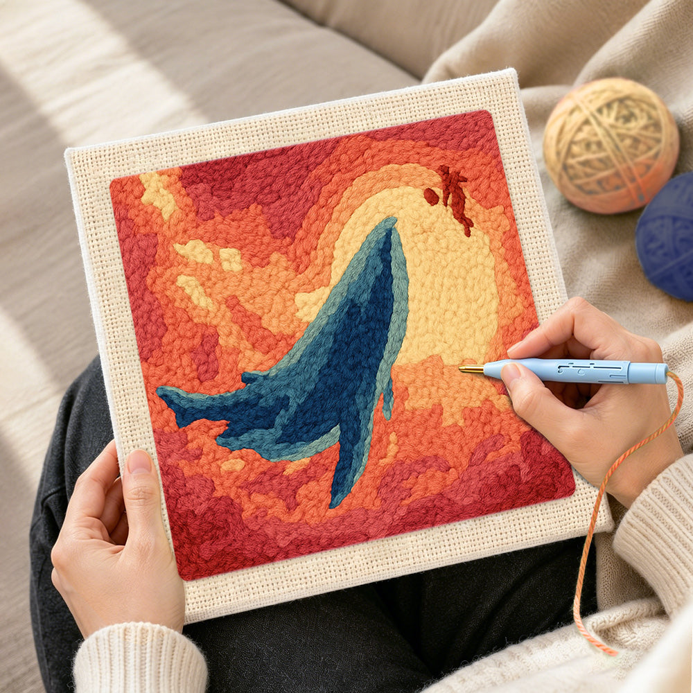 Creating handmade majestic whale sunset punch needle artwork