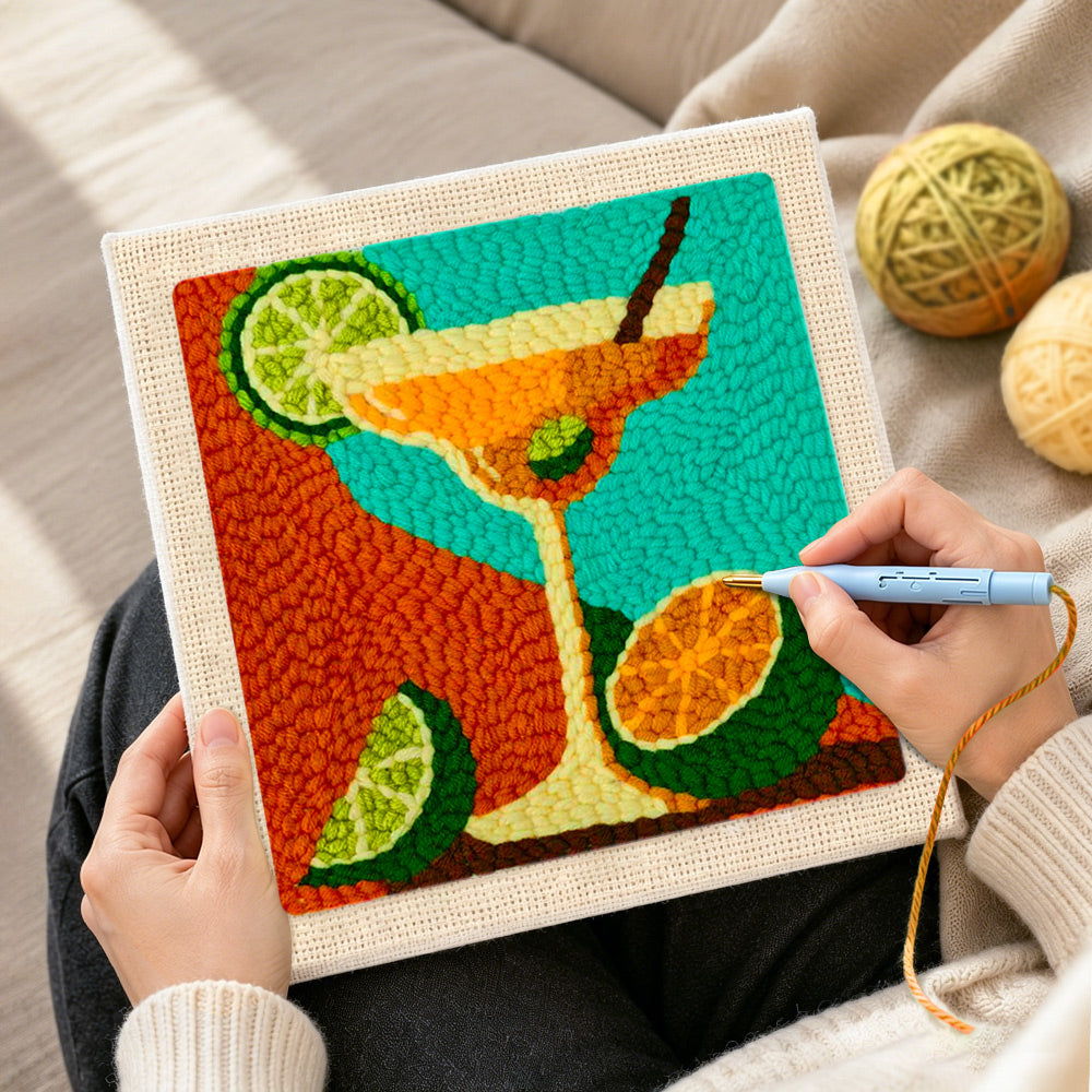 Creating handmade margarita cocktail with lime and citrus punch needle artwork
