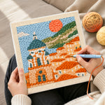 Creating handmade mediterranean coastal town punch needle artwork