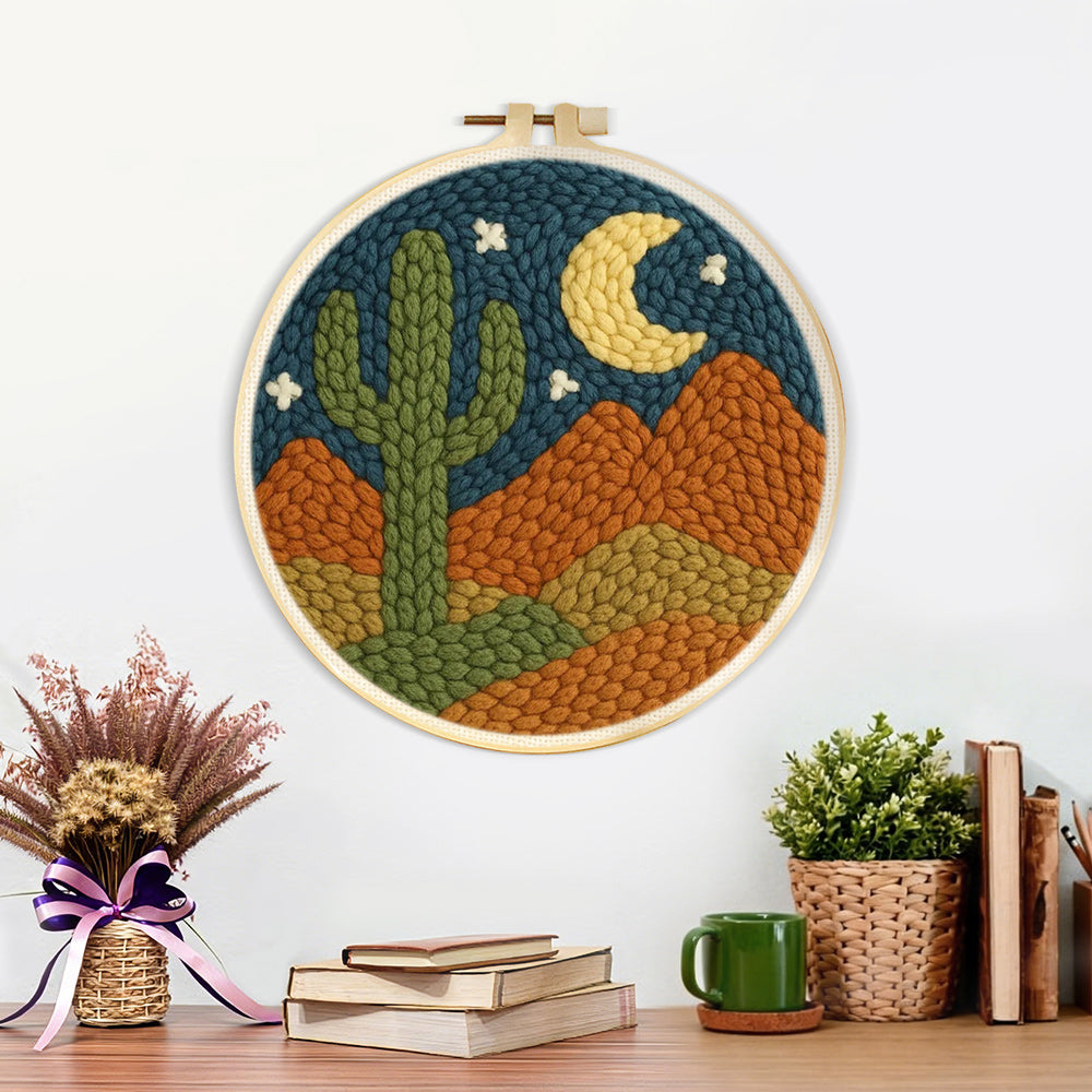 Finished midnight desert cactus artwork displayed on a wall