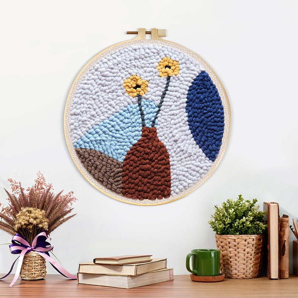 Finished minimalist flower arrangement artwork displayed on a wall