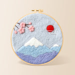 Minimalist mount fuji needle felting kit for beginners with a round wooden frame