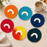 Minimalist rainbow arc punch needle coasters used for home decoration