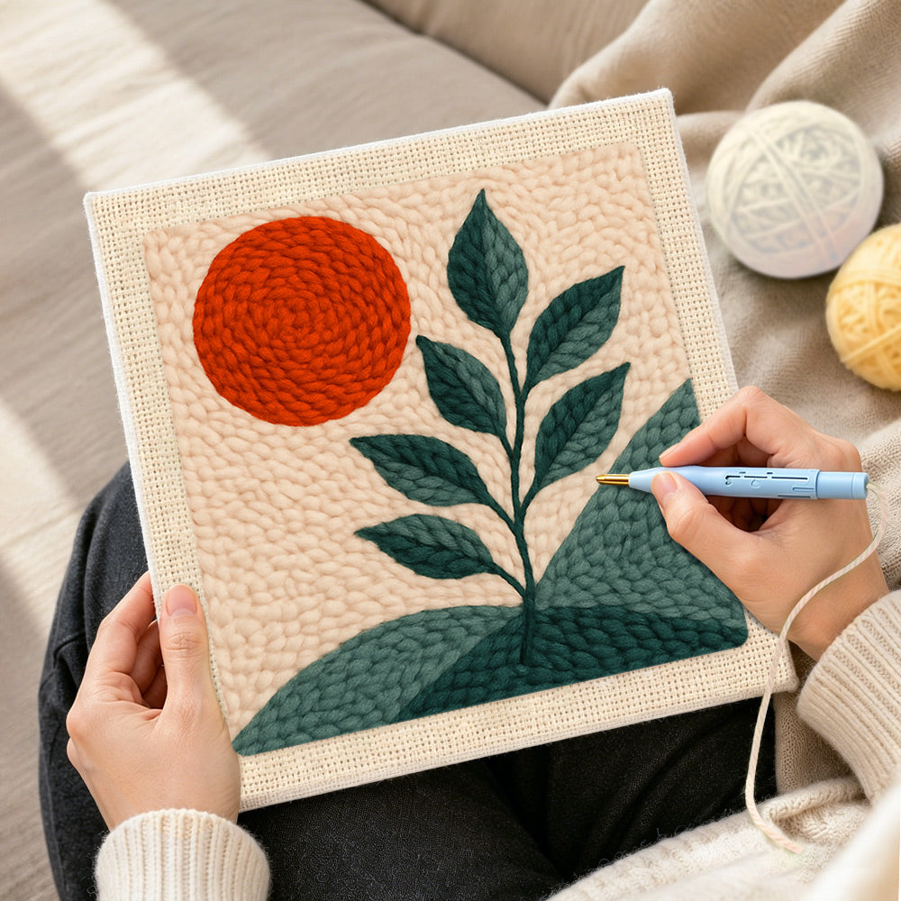 Creating handmade minimalist sun and plant punch needle artwork