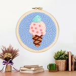 Finished mint and pink scoop ice cream artwork displayed on a wall