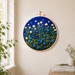 Mint green and blue roses at night needle felt wall art displayed in a bright home interior