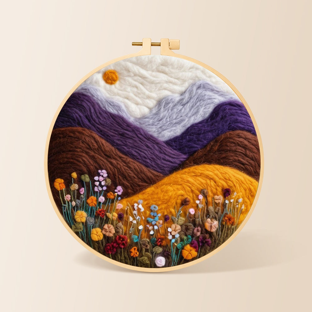 Misty purple mountains and wildflowers needle felting kit for beginners with a round wooden frame