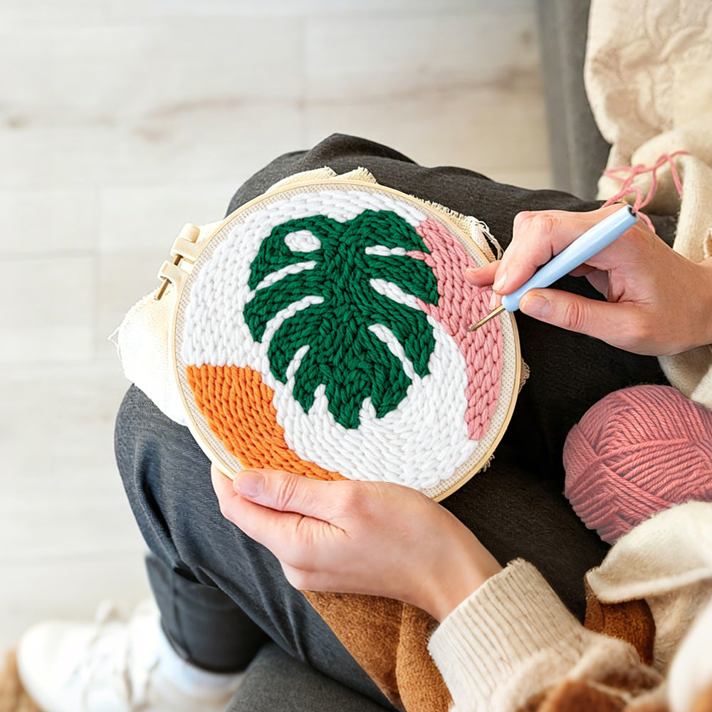 Creating handmade modern monstera leaf punch needle artwork