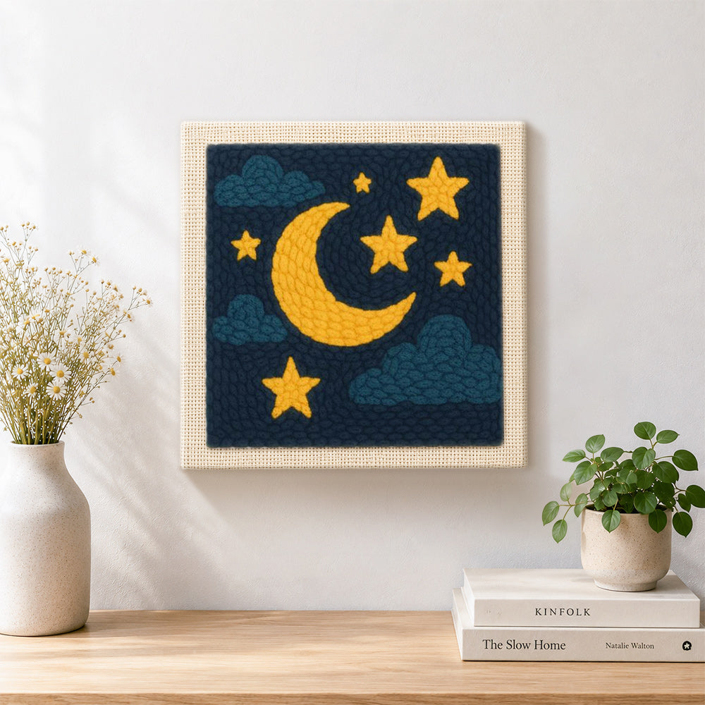 Finished moon and stars artwork displayed on a wall